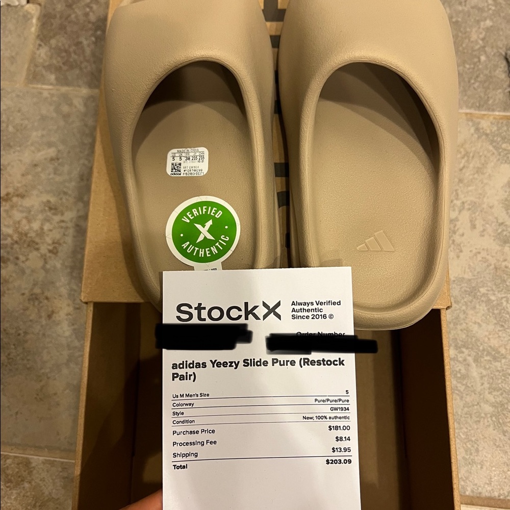 Brand new authentic Yeezy slides pure.  US 5
